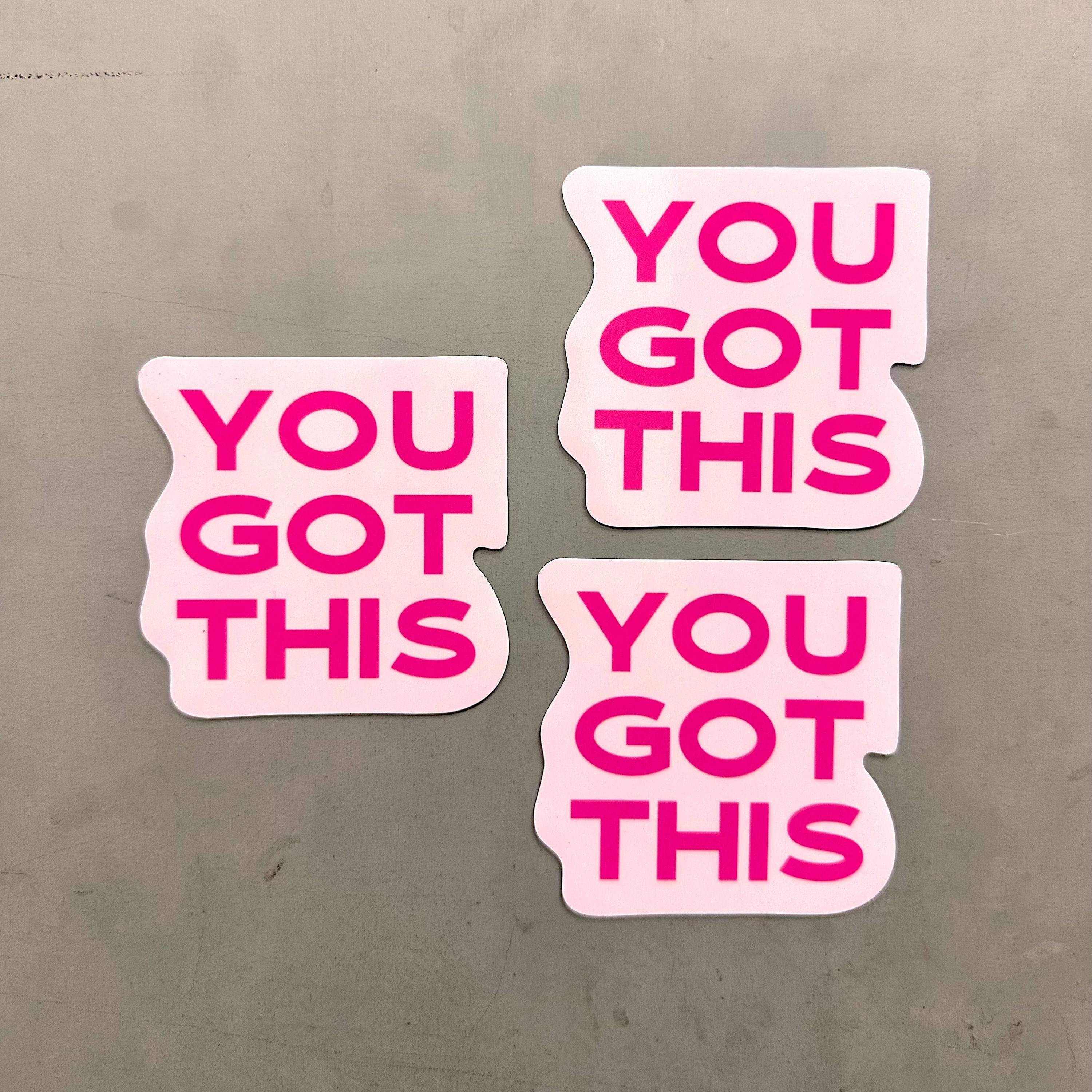 Custom “YOU GOT THIS” magnets with bold pink text on a light pink background, perfect for motivational decor on fridges, lockers, or office whiteboards.