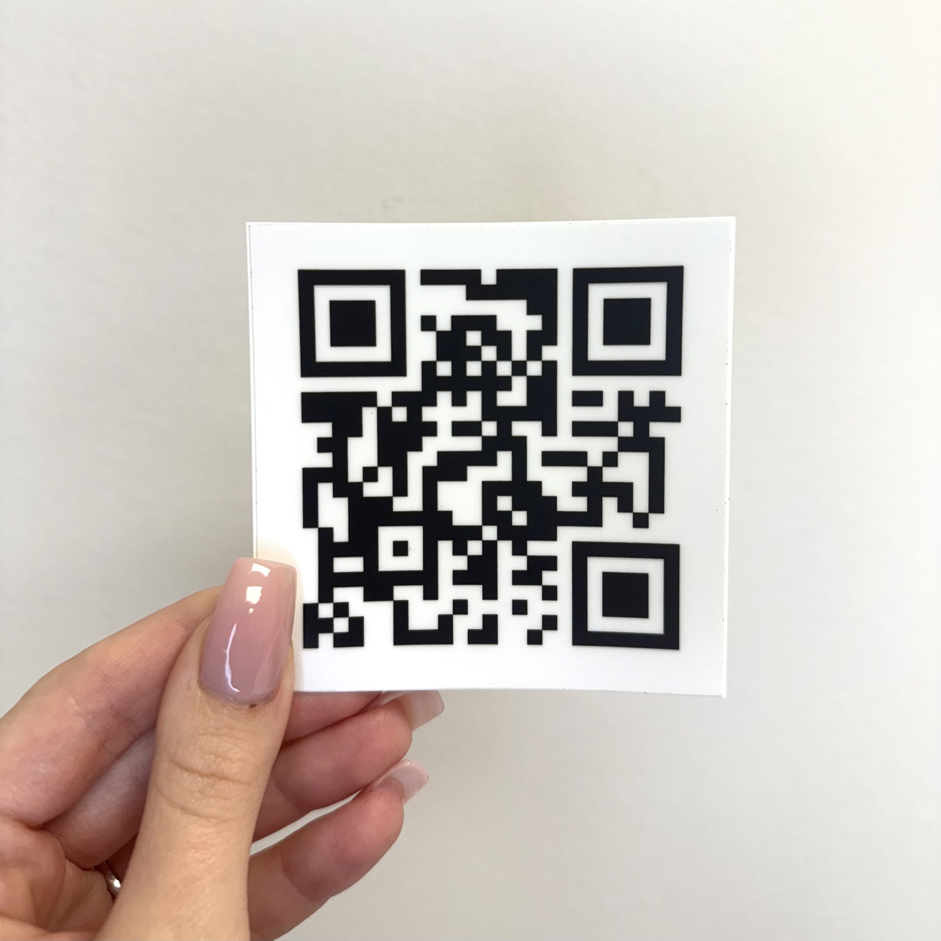 Custom QR code sticker printed on durable white 3M vinyl